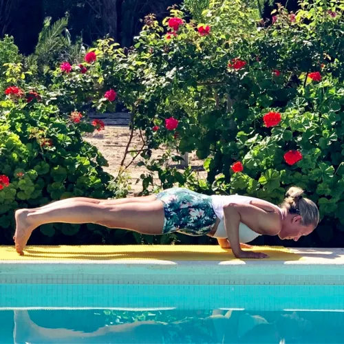 Lee-ann in plank by the pool