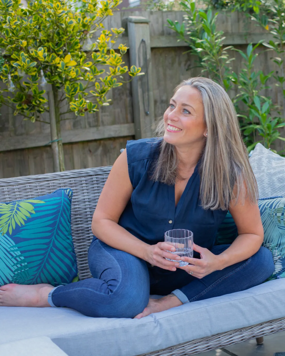 Lee-ann relaxing with a drink after practice